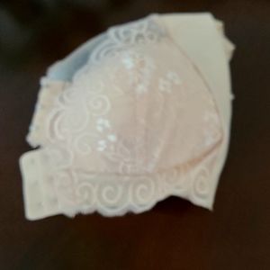 Never worn New Bra. Beige Size Large